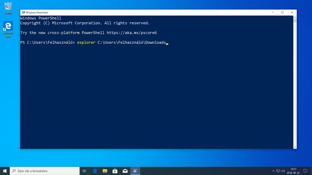A Fájlkezelő indítása a Windows PowerShell ablakában. A fókusz a felhasználó Letöltések mappáján lesz.